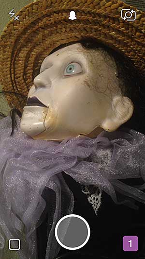 Press the large circle to take a photo or video, then use the text and drawing tools (top right) to annotate and decorate.